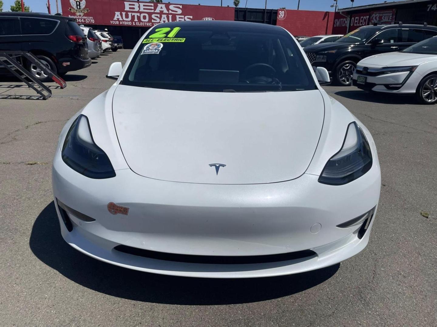 2021 WHITE Tesla Model 3 Standard Range Plus (5YJ3E1EA7MF) with an ELECTRIC engine, 1A transmission, located at 722 E Miner Ave, Stockton, CA, 95202, (209) 871-6645, 37.956711, -121.282310 - PLUS TAXES AND FEES NO CHARGER AVAIABLE - Photo#2