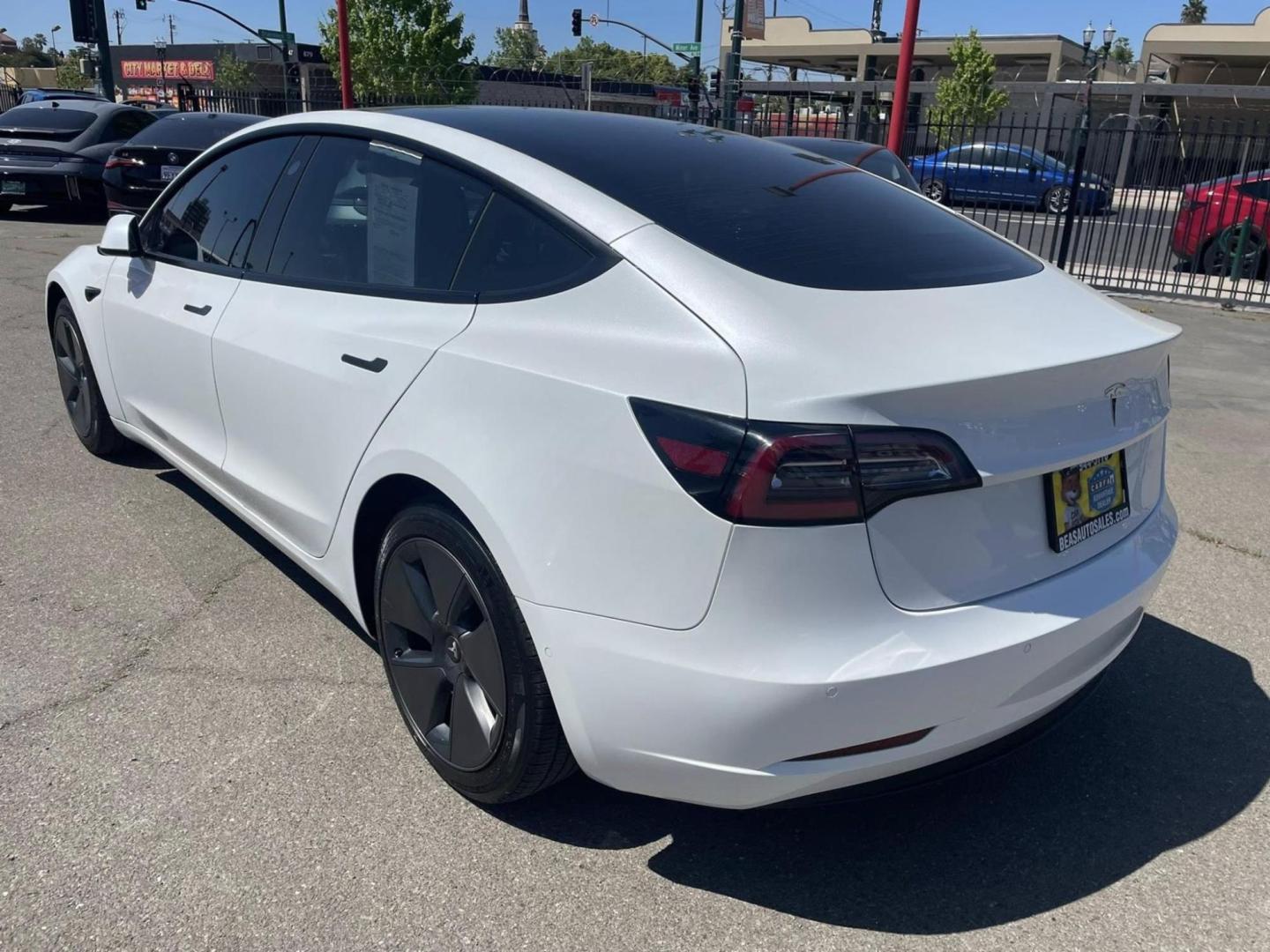2021 WHITE Tesla Model 3 Standard Range Plus (5YJ3E1EA7MF) with an ELECTRIC engine, 1A transmission, located at 722 E Miner Ave, Stockton, CA, 95202, (209) 871-6645, 37.956711, -121.282310 - PLUS TAXES AND FEES NO CHARGER AVAIABLE - Photo#9